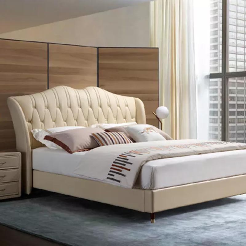 Letto in vera pelle con schienale alto e base in legno massello